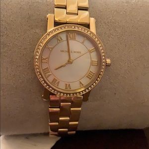 lmichael Kors ladies gold tone watch